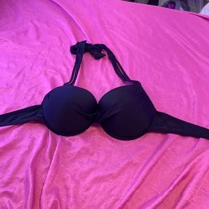 My name is Miley Tabor, and i am selling a black bathing suit top, size is 2XL